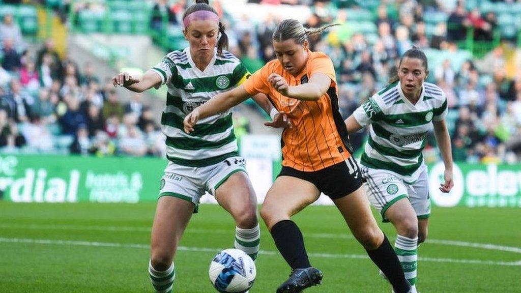 Glasgow City's Emily Whelan tussles with Celtic's Caitlin Hayes