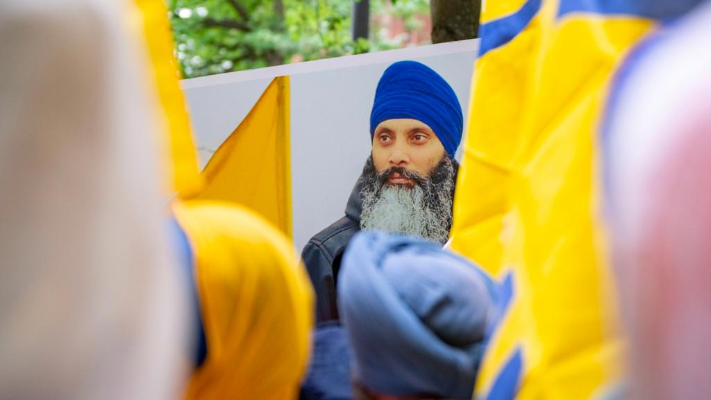 Protesters gather outside of the Consulate General of India Office during a protest for the recent shooting of Shaheed Bhai Hardeep Singh Nijjar in Vancouver, on Saturday, 24 June 2023