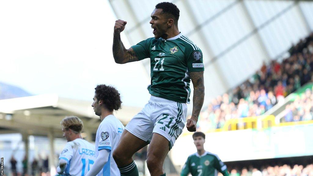 Leap of joy for Josh Magennis after scoring Northern Ireland's second goal against San Marino