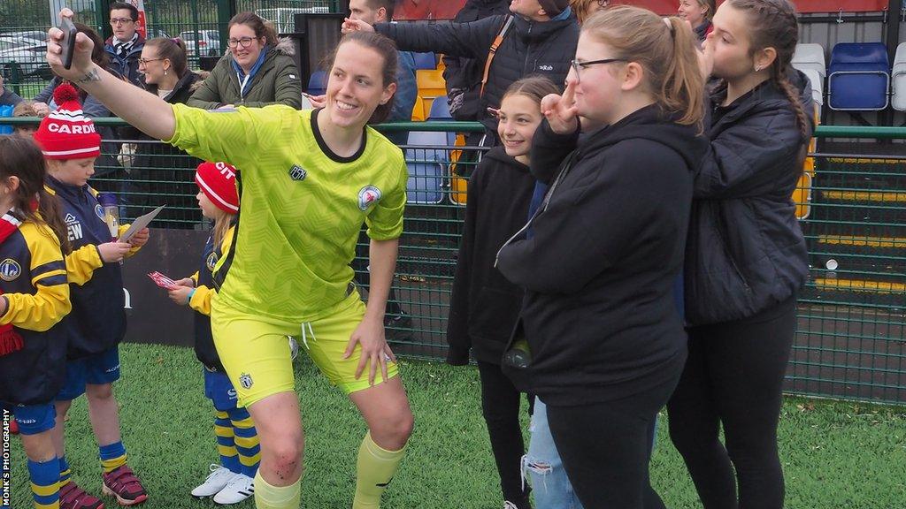 Wales and Cardiff City Ladies goalkeeper Laura O'Sullivan takes a selfie with fans