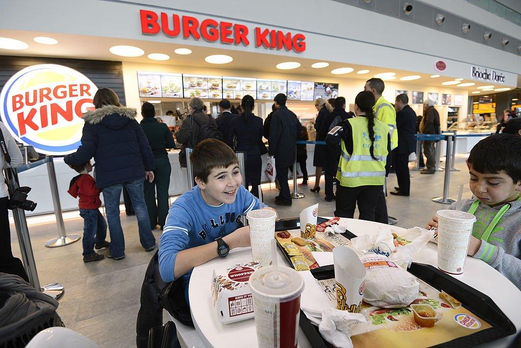 Customers eat at the Burger King fast food restaurant in Marseille's airport.