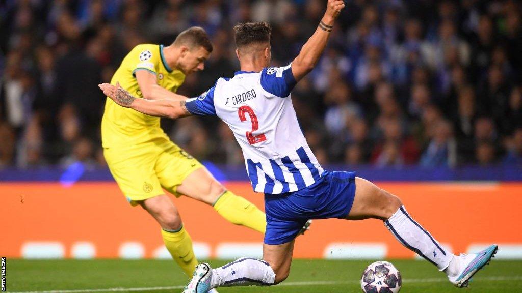 Edin Dzeko has a shot for Inter Milan against Porto