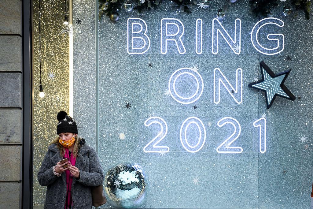 Woman outside shop