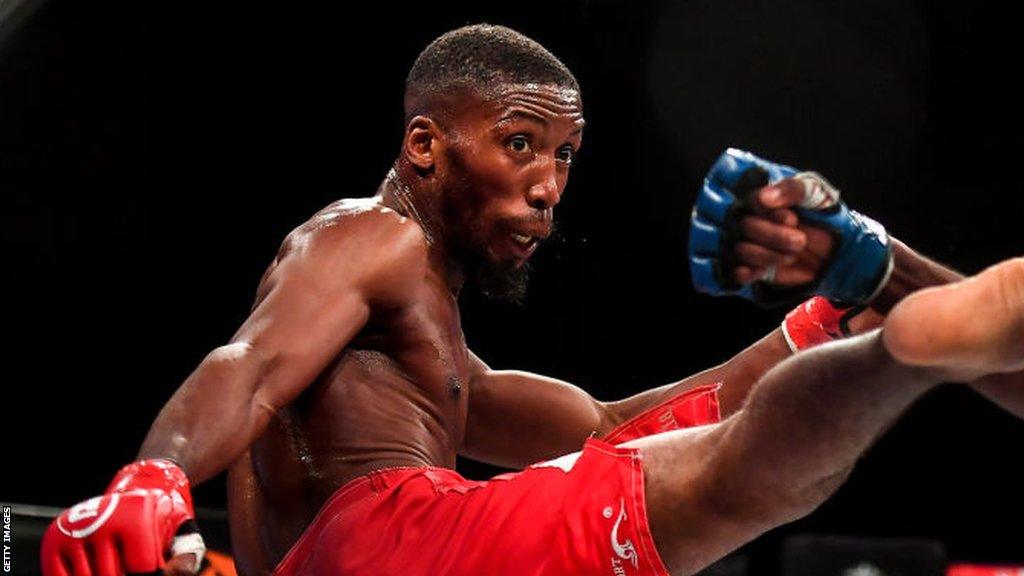 MMA fighter Frans Mlambo throwing a punch