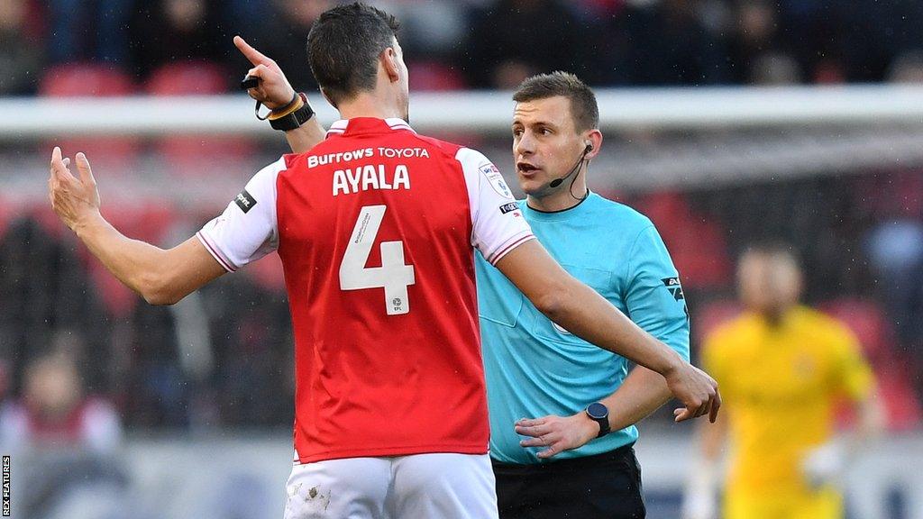 Daniel Ayala is sent off by referee Josh Smith