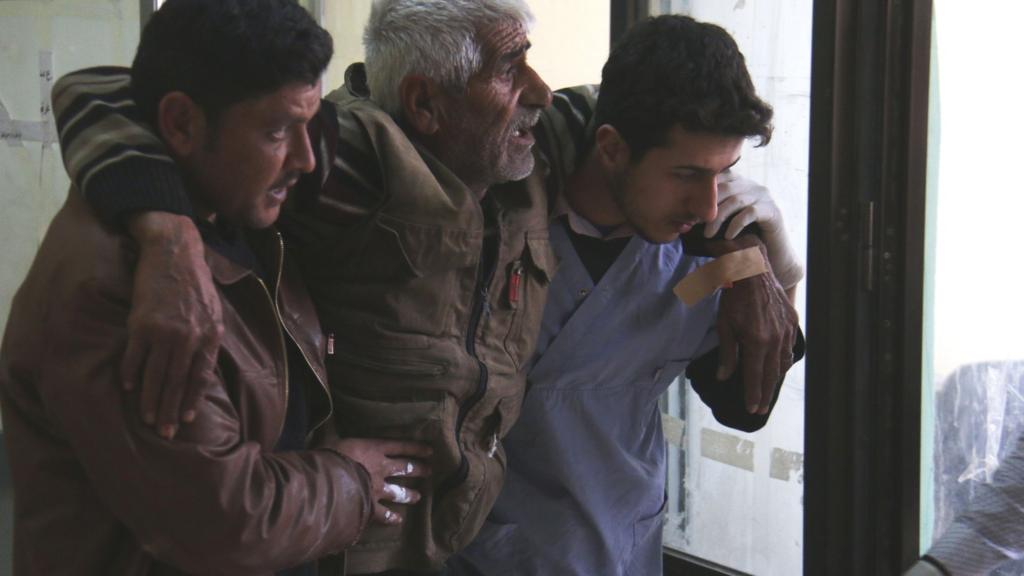 Syrian man receives treatment at a makeshift hospital in Azaz