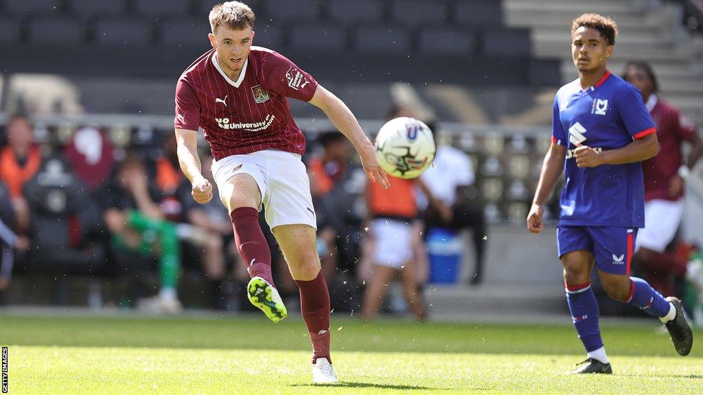 Marc Leonard playing for Northampton against MK Dons in a pre-season friendly