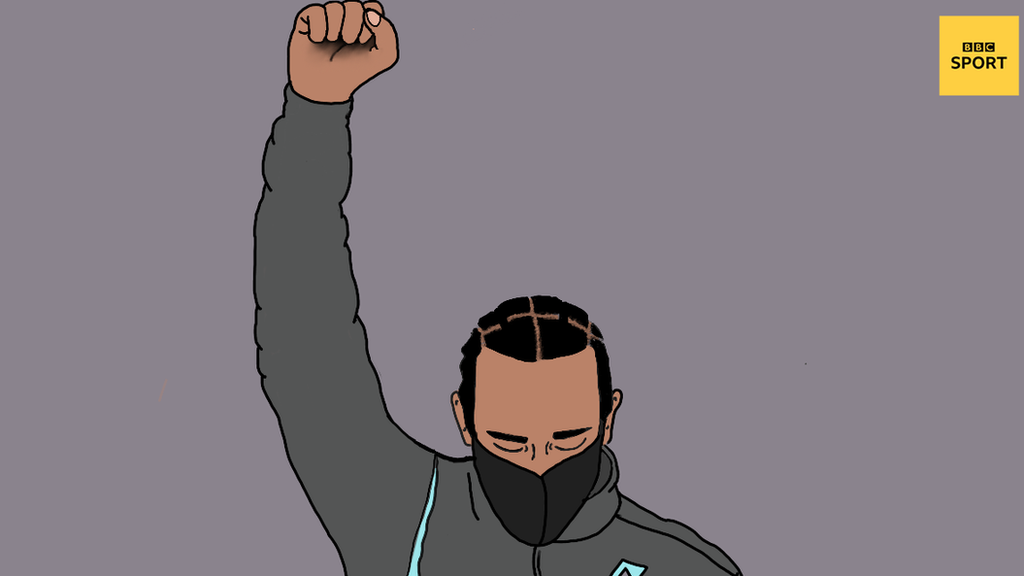 Lewis Hamilton with his fist raised