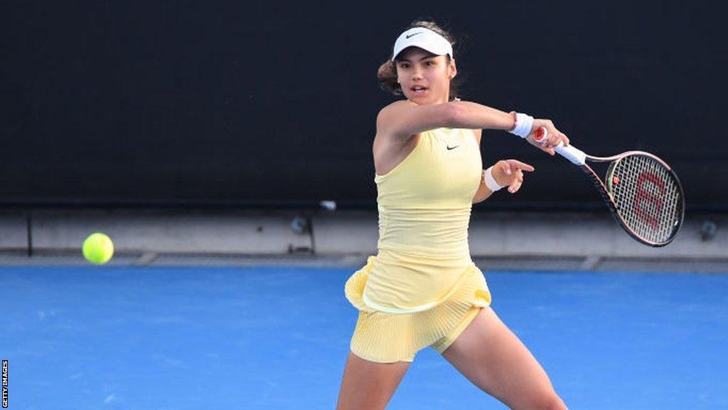 Emma Raducanu hits a return at the 2024 Australian Open