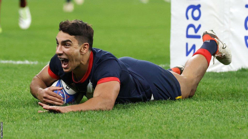 Santiago Carreras scores a try for Argentina