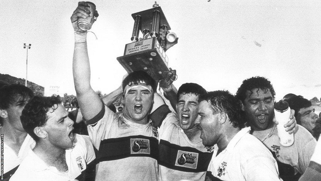 Dan McKellar (third from the left) celebrates his title win with the Burdekin Canetoads