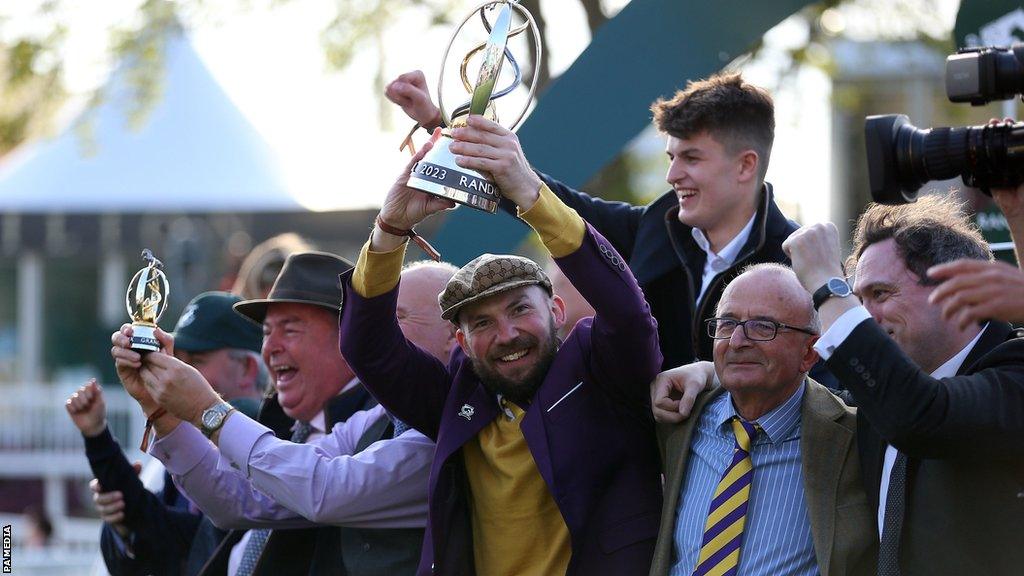 Corach Rambler's co-owners celebrate the Grand National win