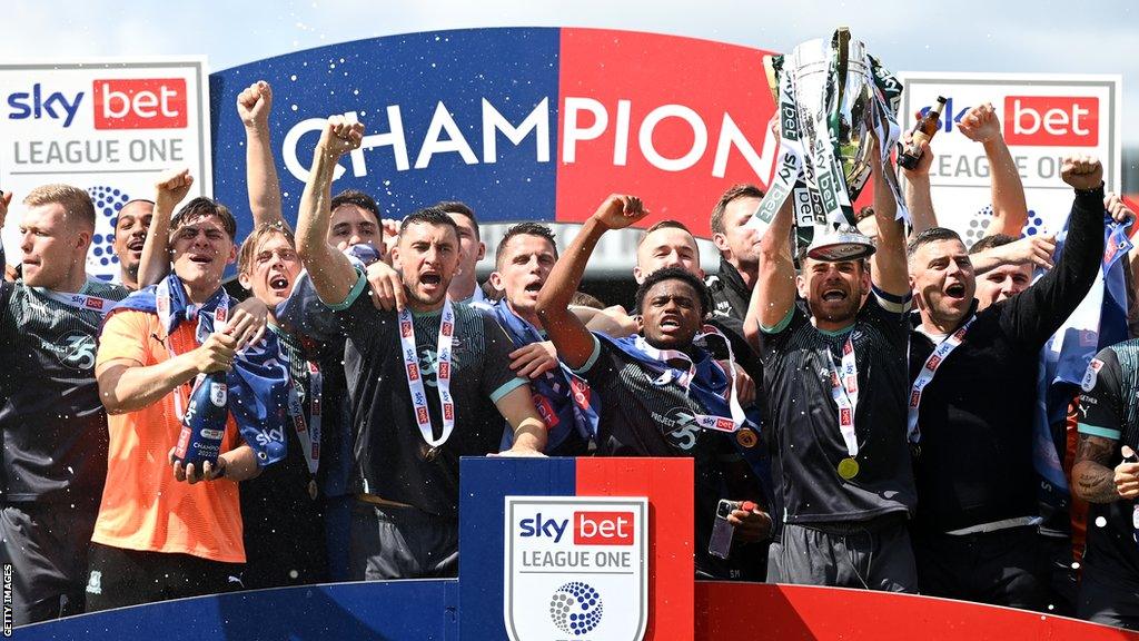 Plymouth Argyle celebrate winning the League One title