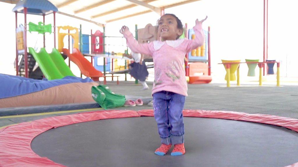 A girl on a trampoline