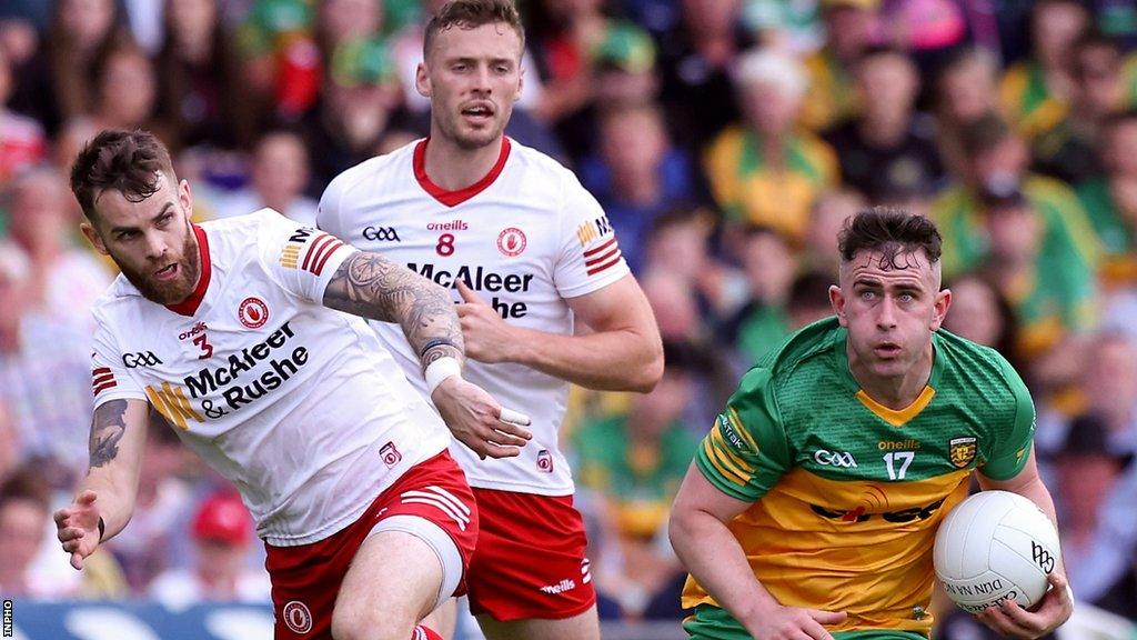 Donegal's Patrick McBrearty attempts to get away from Tyrone's Ronan McNamee and Brian Kennedy