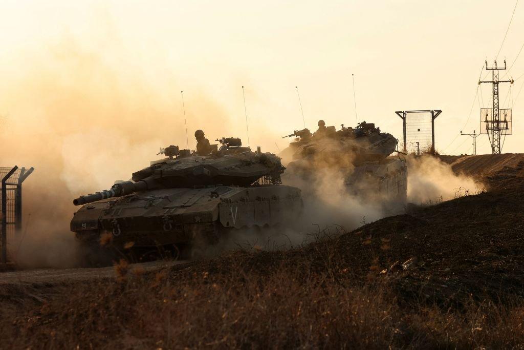 Israeli tanks moving in an undisclosed location near the Gaza Strip