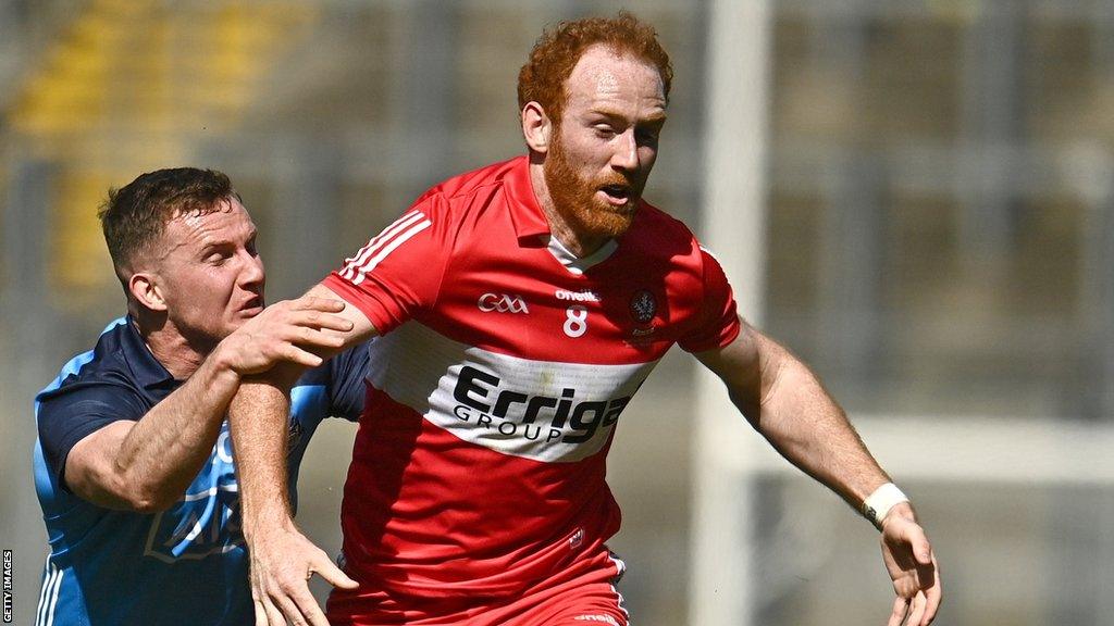 Conor Glass battles with Dublin's Ciaran Kilkenny at Croke Park