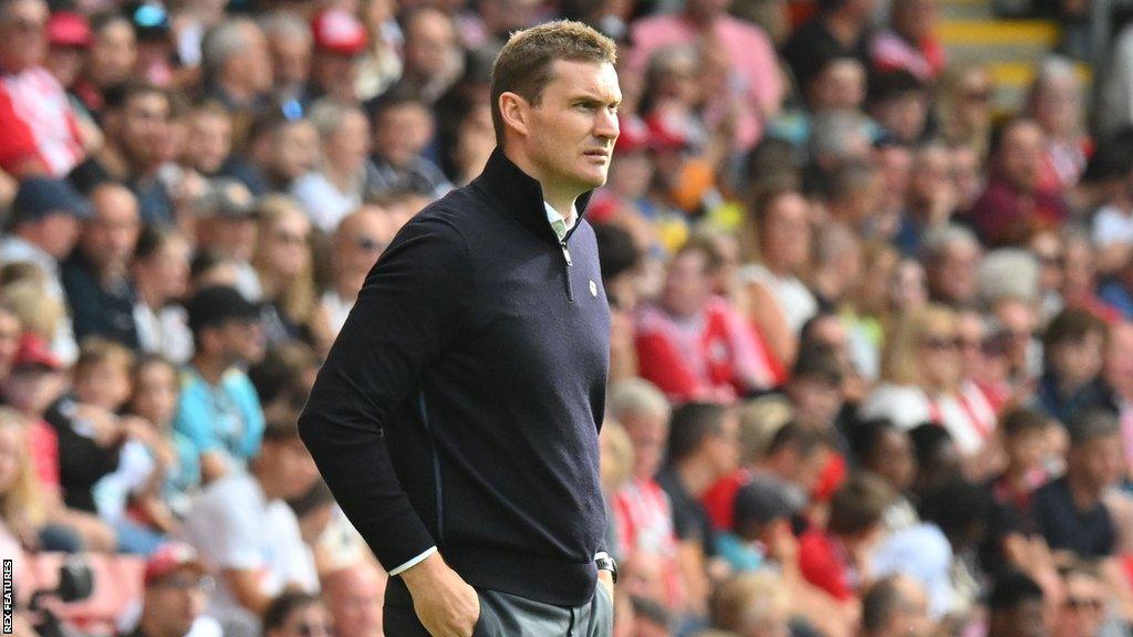 Matt Taylor looks on from the touchline for Rotherham