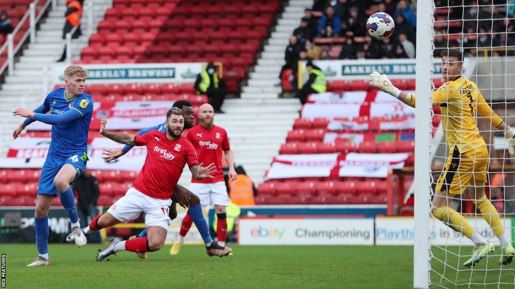 Charlie Austin scoring his first goal for Swindon for 12 years