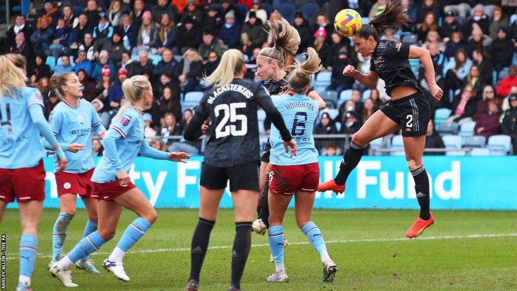 Rafaelle Souza celebrates scoring a goal for Arsenal