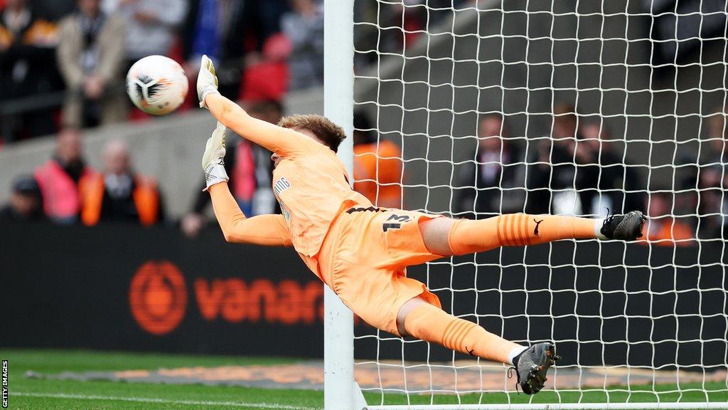 Archie Mair saves a penalty while at Notts County