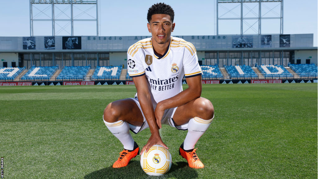 Jude Bellingham poses in a Real Madrid kit after signing from Borussia Dortmund