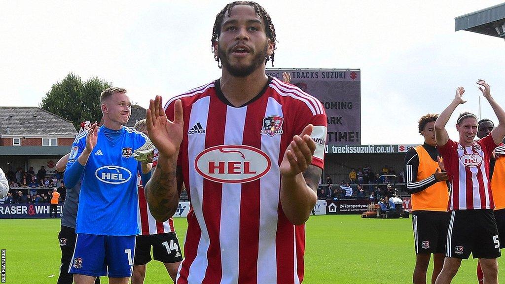 Sam Nombe applauds Exeter's fans