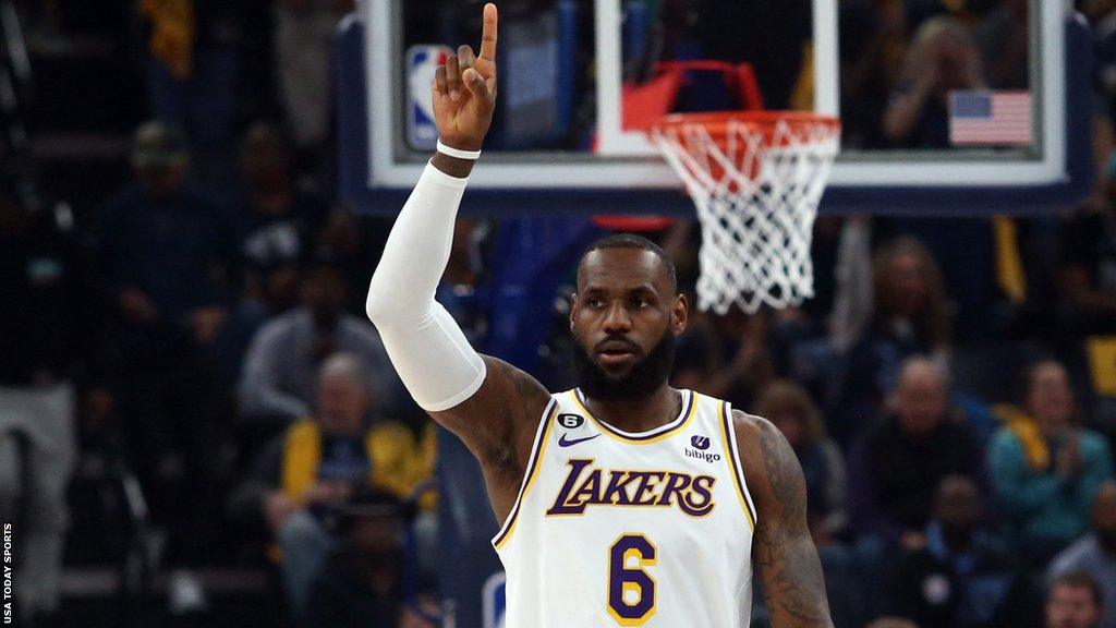 Los Angeles Lakers star LeBron James points upwards during a play-off game against the Memphis Grizzlies