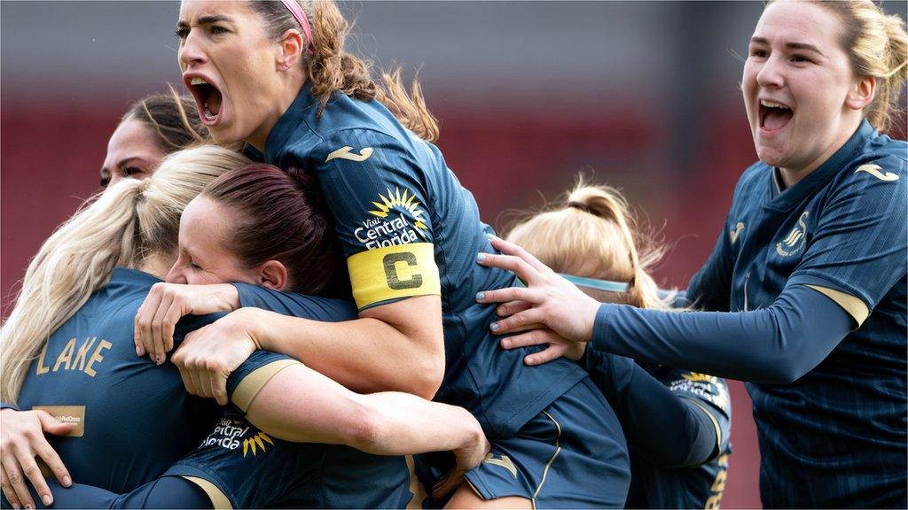 Swansea City players celebrate Ellie Lake's late goal