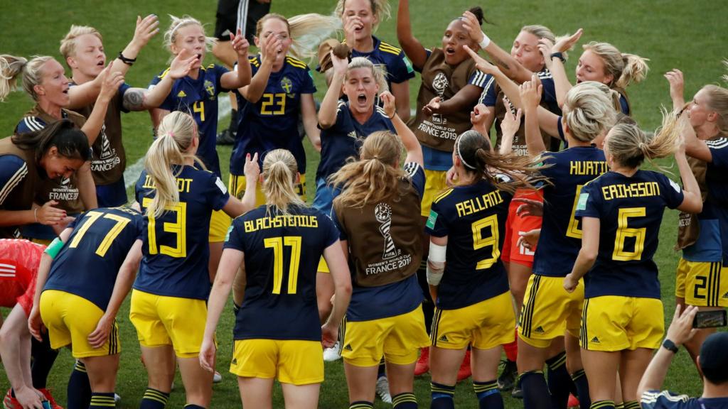 Sweden players celebrate after full-time