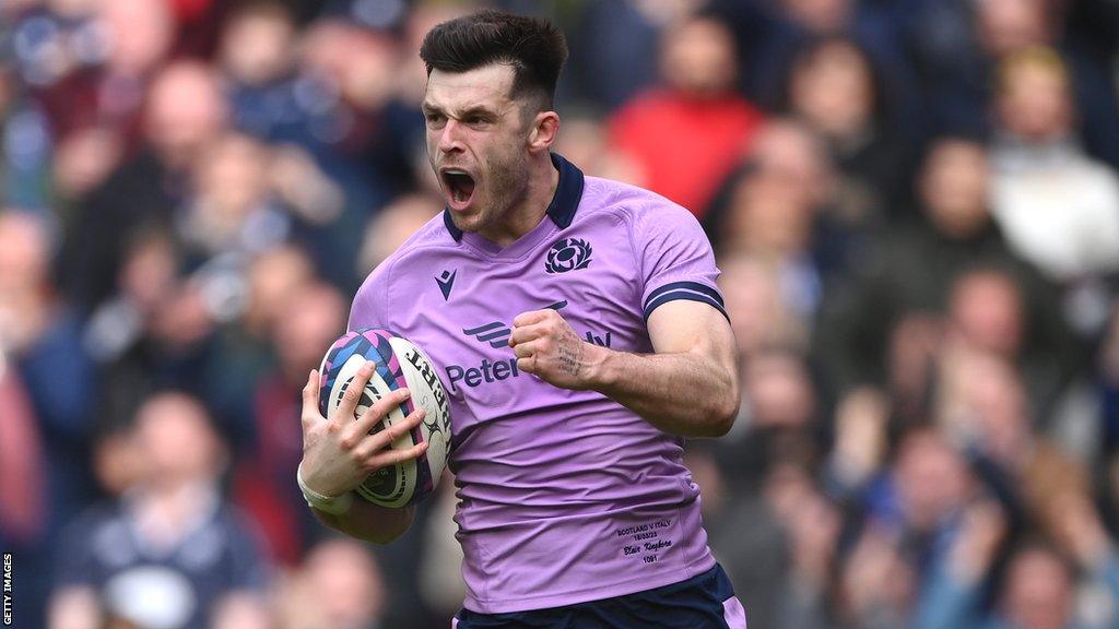 Blair Kinghorn celebrates a try against Italy