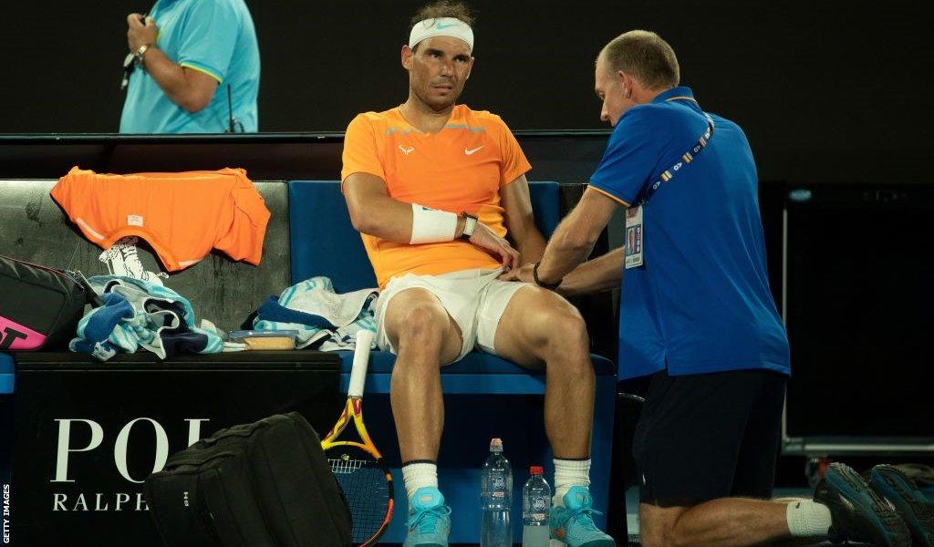 Rafael Nadal receives treatement at the Australian Open in January