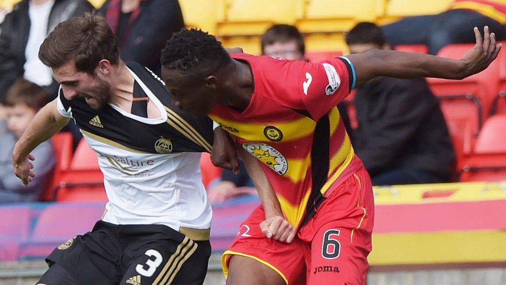 Graeme Shinnie and Abdul Osman