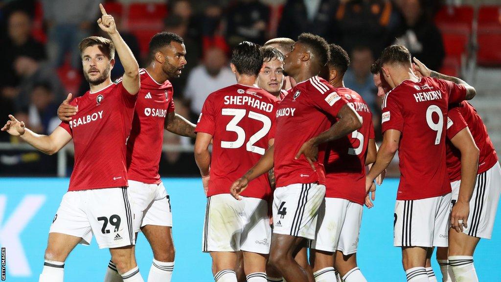 Salford City players celebrate