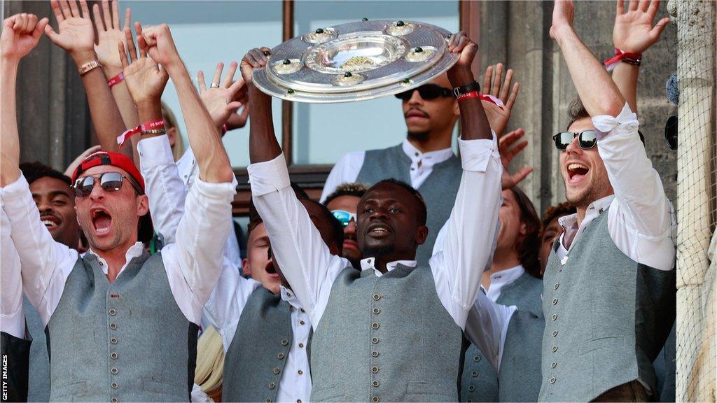 Bayern Munich players with Bundesliga trophy