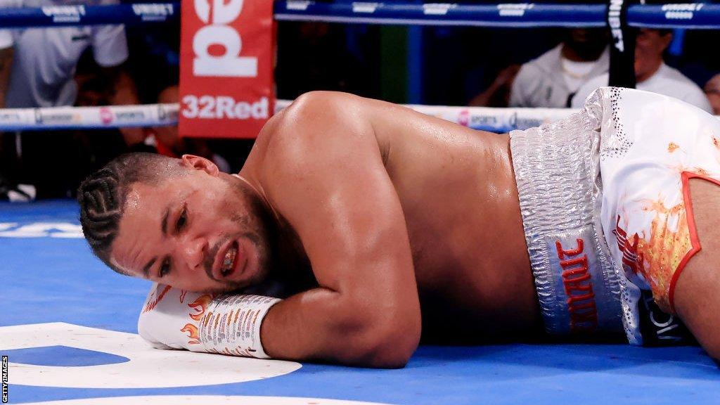 Joe Joyce on the floor after being dropped by Zhilei Zhang in their rematch