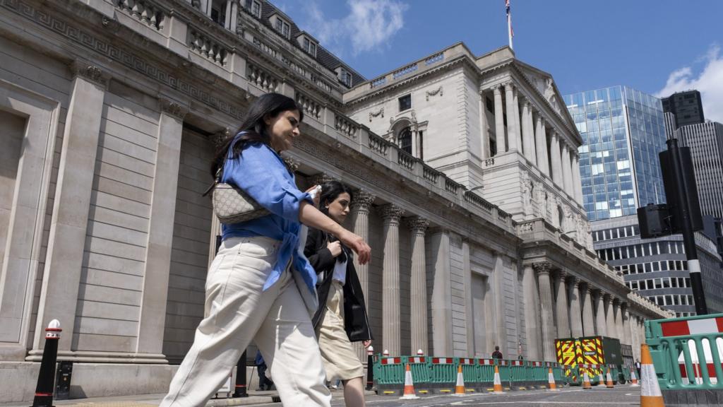 People walking outside Bank of England