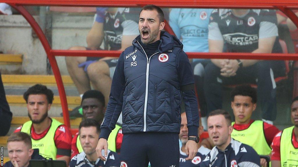 Reading boss Ruben Selles shouts to his team from the dugout during a League One match.