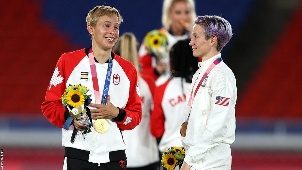 Quinn speaking with Megan Rapinoe