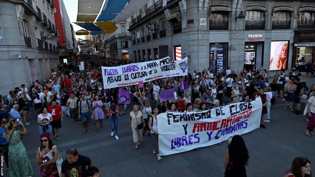 Protestors applaud during a demonstration called by feminist associations in support of Spain's midfielder Jenni Hermoso