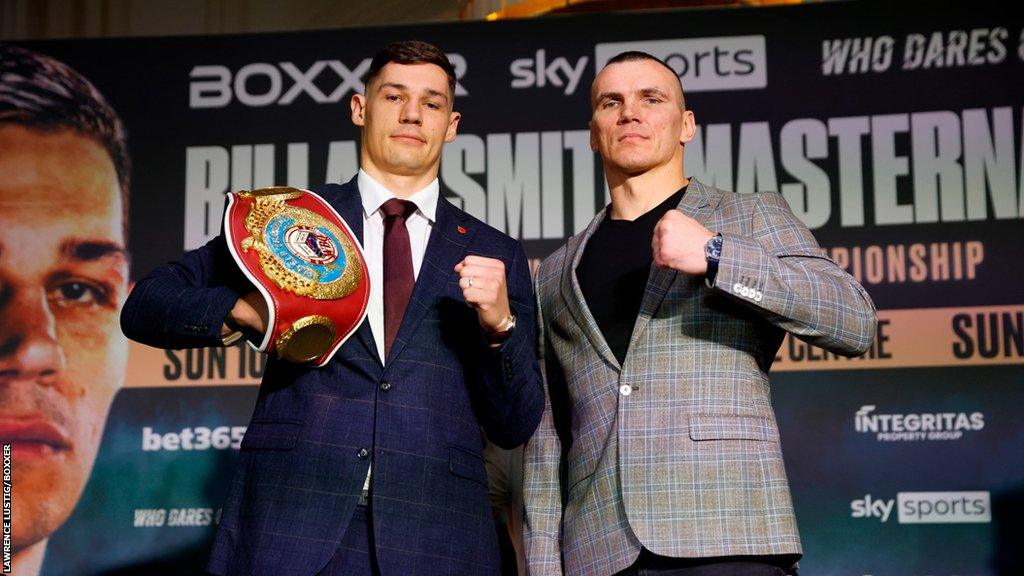 Chris Billam-Smith and Mateusz Masternak pose for a photo together at a press conference in London