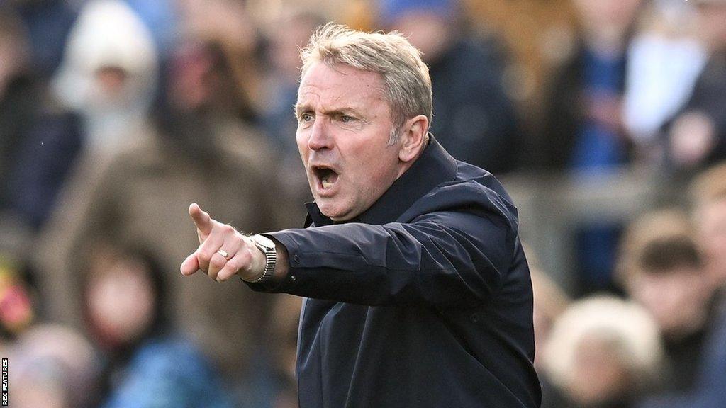 Carlisle manager Paul Simpson pointing during a recent home game