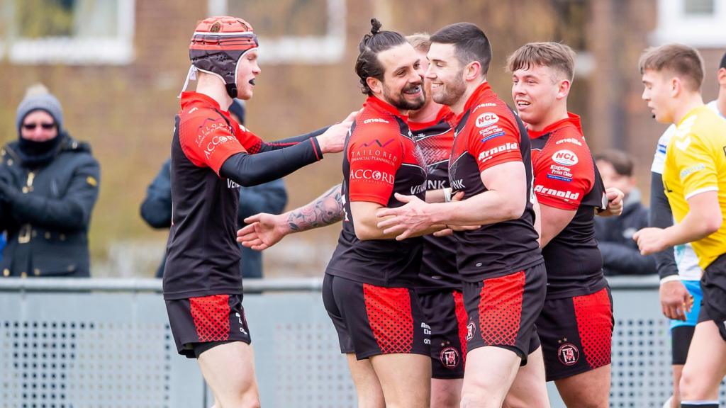 Thatto Heath celebrate