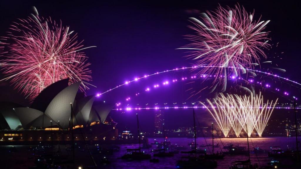 Fireworks explode across Sydney Harbour Bridge