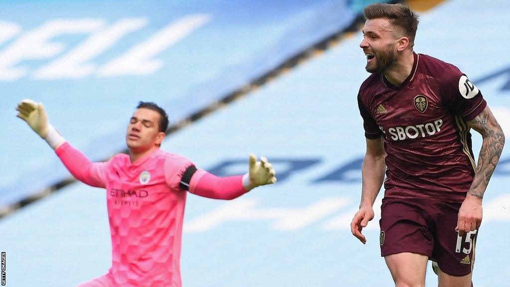 Stuart Dallas celebrates after scoring one of his two goals against Manchester City in April 2021