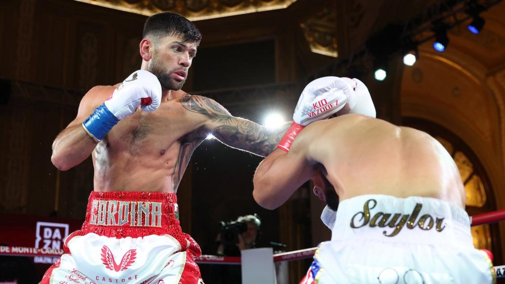 Joe Cordina aims a punch at Edward Vazquez