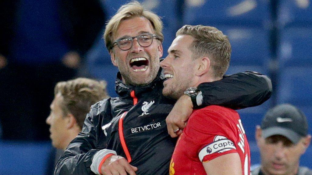 Liverpool boss Jurgen Klopp hugs Jordan Henderson