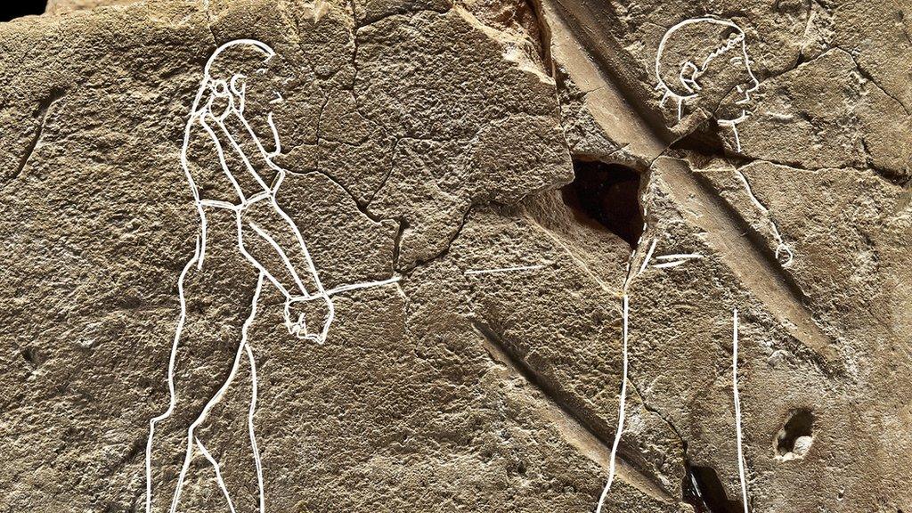 carving-of-ghost-on-tablet