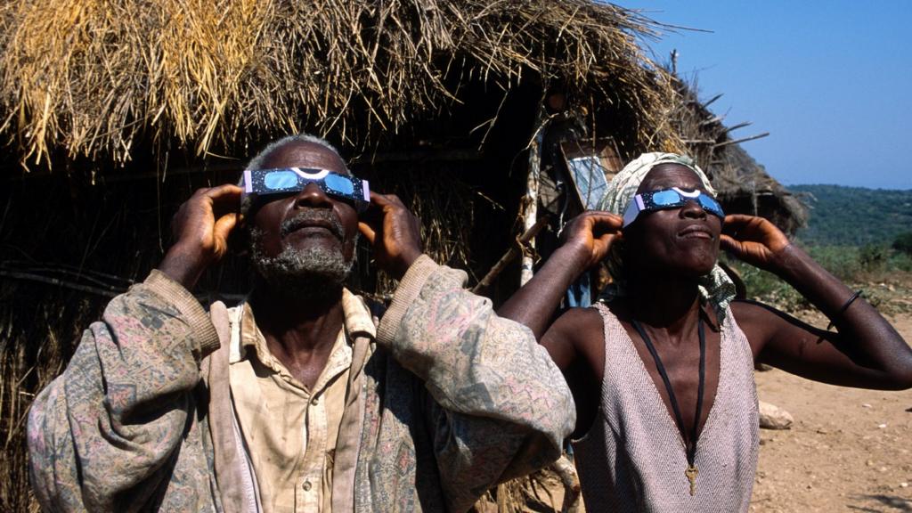 People looking at the eclipse