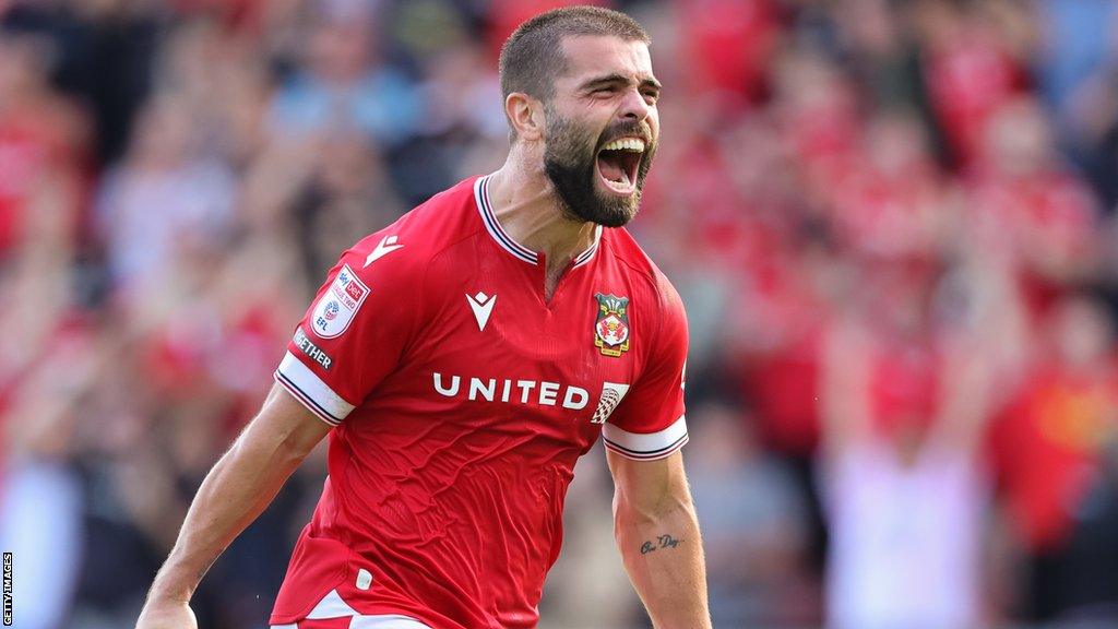 Elliot Lee celebrates his sixth goal of the season